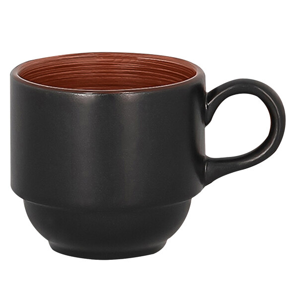 A black porcelain cup with a brown rim and handle.