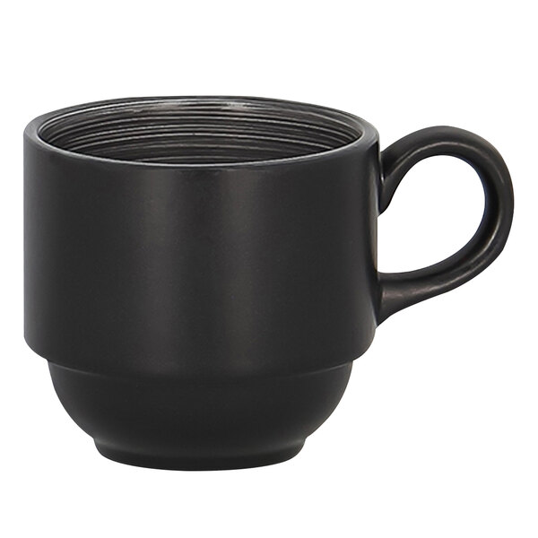 A close up of a grey and black RAK Porcelain Trinidad stackable coffee cup with a handle.