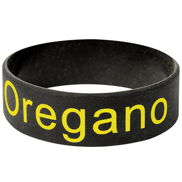 A black silicone wristband with the word "Oregano" in yellow.