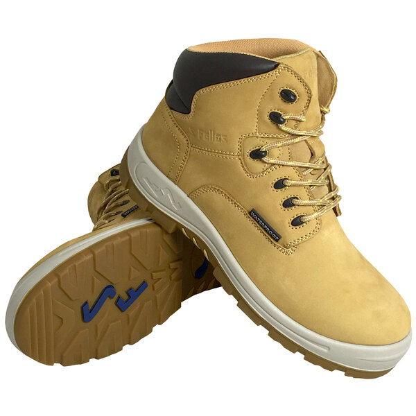 A pair of wheat yellow Genuine Grip women's safety boots with laces.