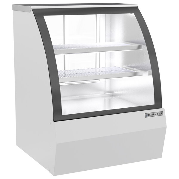 A white Beverage-Air dry bakery display case with curved glass doors.