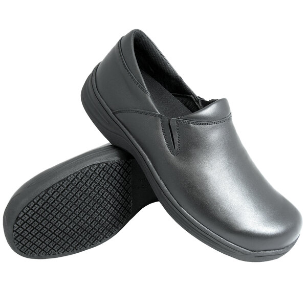 A pair of black Genuine Grip slip-on leather shoes.