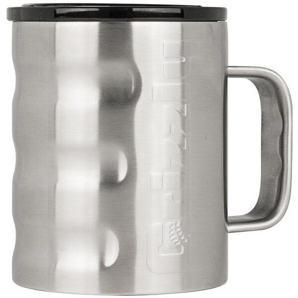 A silver Grizzly stainless steel camp cup with a black lid.