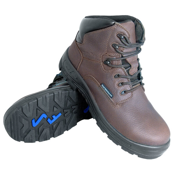 A pair of brown Genuine Grip Poseidon work boots with blue accents.