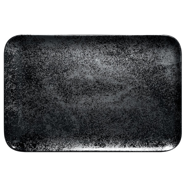 A black rectangular RAK Porcelain plate with a speckled design.