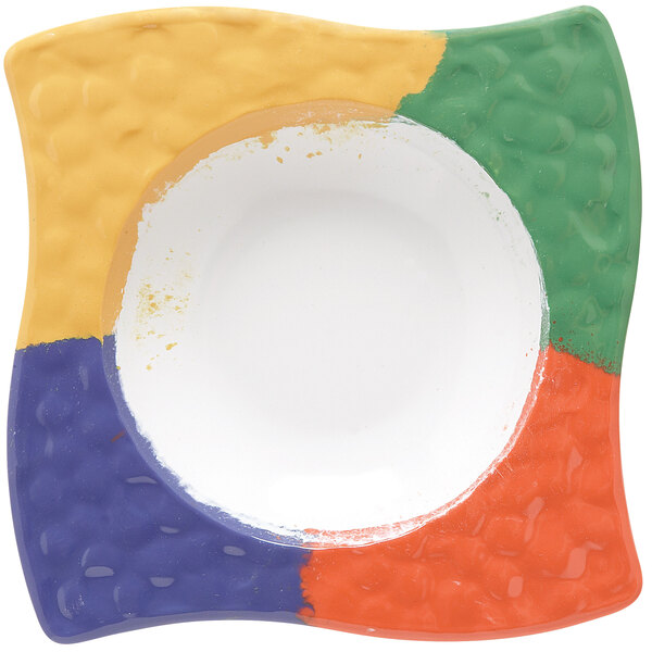 A white square melamine bowl with a colorful design on it.