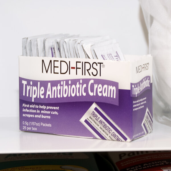 A box of Medique antibiotic cream packets.