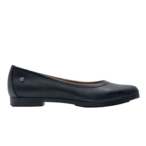 A black Shoes For Crews Reese dress shoe.