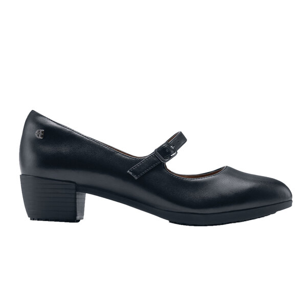 A black women's Shoes For Crews Vita mary-jane shoe with a buckle.