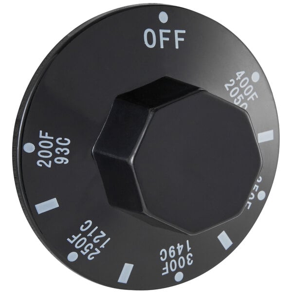 A black Main Street Equipment thermostat knob with white text.