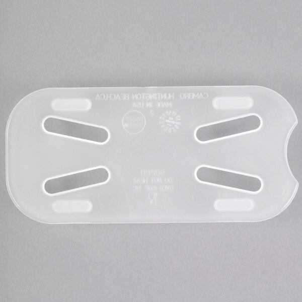 A translucent plastic Cambro drain tray with four holes.