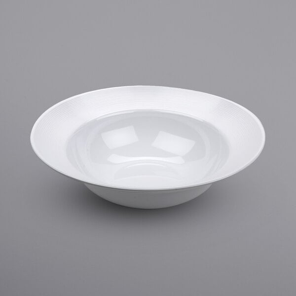 A white Minski melamine bowl with a textured rim.