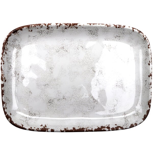 A white and brown rectangular melamine platter.