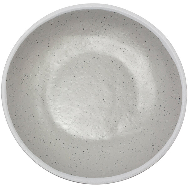 A white melamine serving bowl with speckled texture.