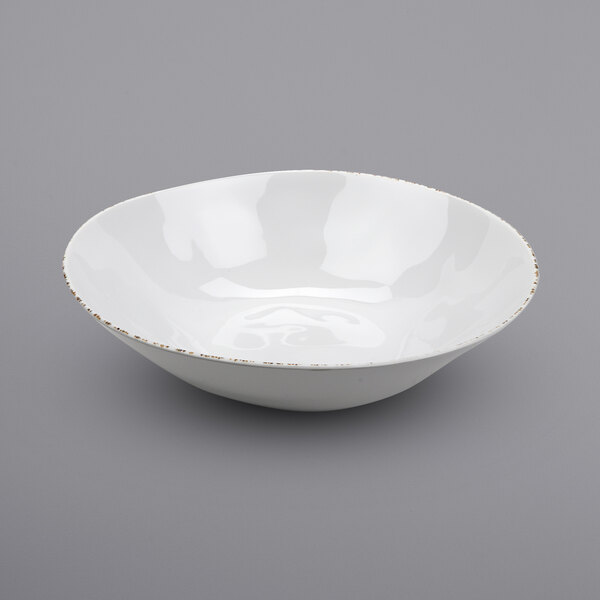 A white bowl with gold specks.