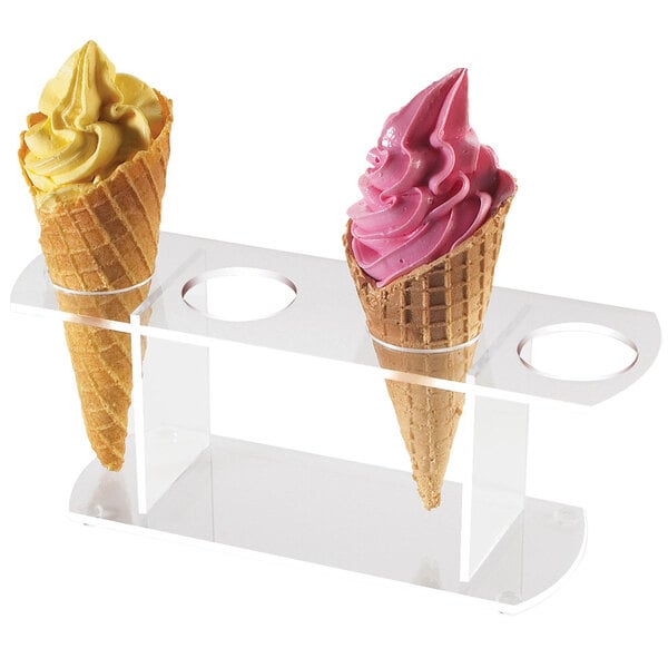 A clear Cal-Mil ice cream cone stand holding two cones.