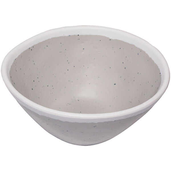 A white bowl with small speckled grey accents.