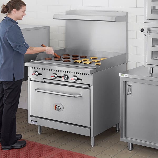 Cooking Performance Group S60-G24-N Natural Gas 6 Burner 60 Range with 24  Griddle and 2 Standard Ovens - 280,000 BTU