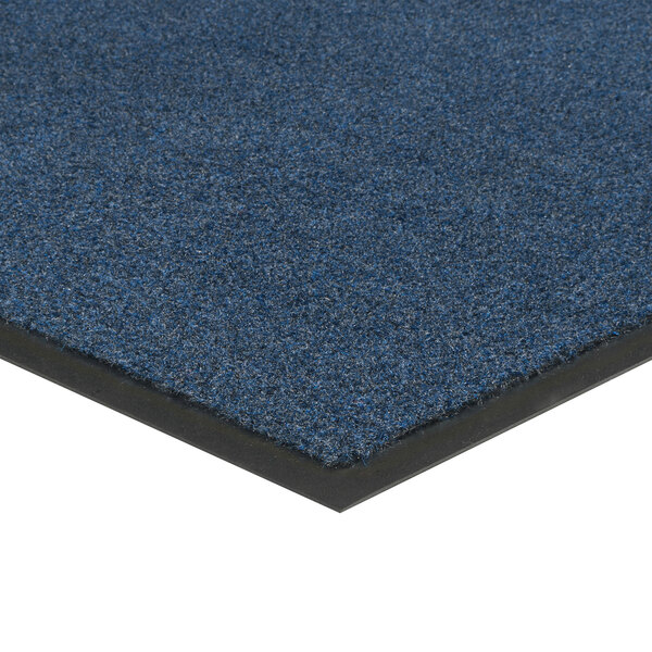 A blue carpet mat with black border.