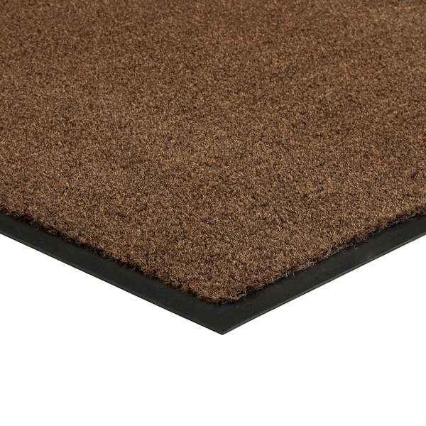 A light brown Lavex Olefin entrance mat with black rubber edges.