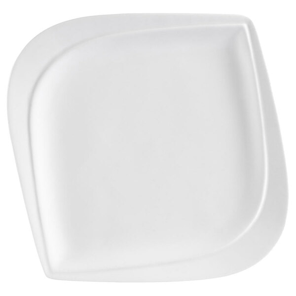 A CAC Aspen Tree bone white porcelain square plate with a curved edge.