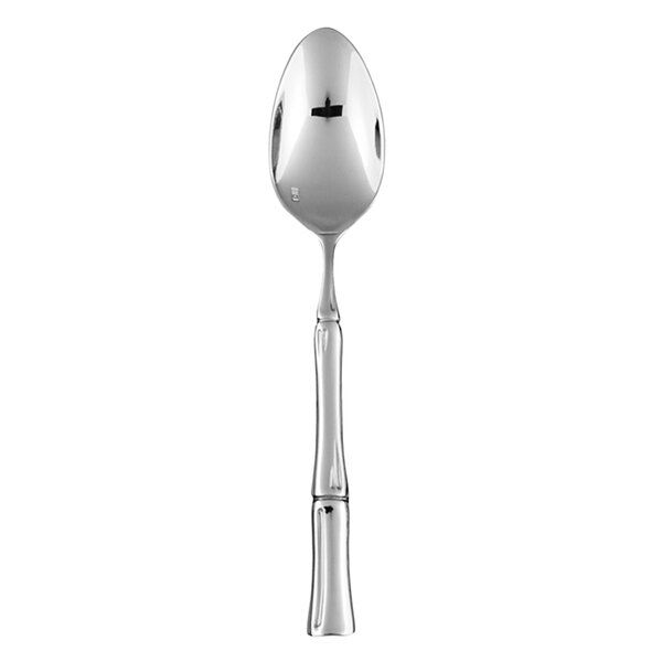 A Fortessa Royal Pacific stainless steel soup/dessert spoon with a handle.