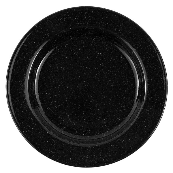 A black Crow Canyon Home Stinson enamelware salad plate with a speckled surface and wide rim.