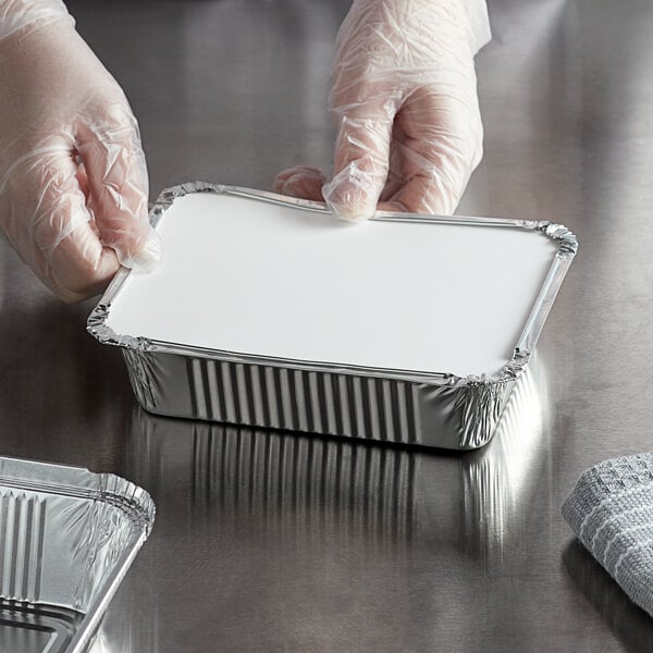 Choice 1 1/2 lb. Deep Oblong Foil Container with Board Lid - 50/Pack