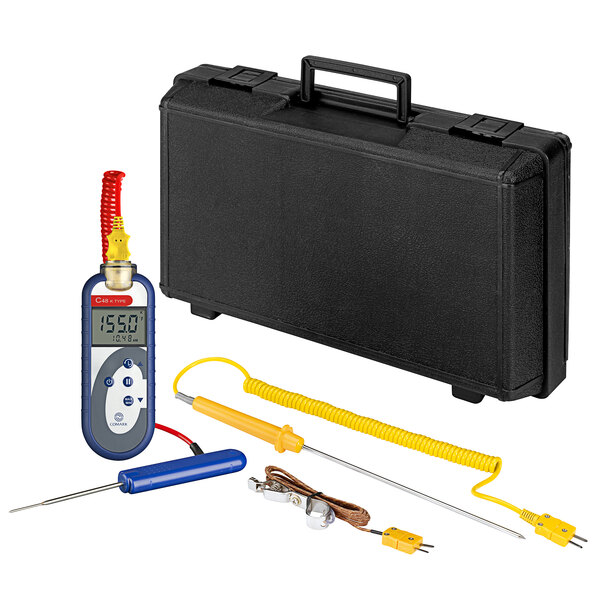 A black case with a Comark thermometer kit, probes, and accessories.