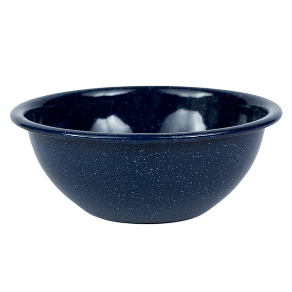 A navy blue Crow Canyon Home enamelware bowl with speckles and a black rim.