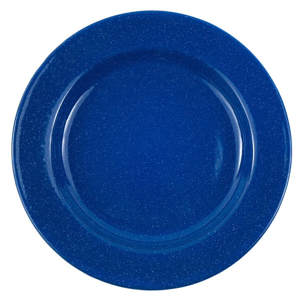 A white enamelware salad plate with a blue speckled surface and wide rim.