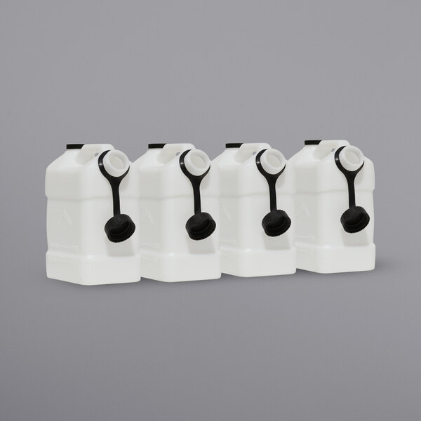 Four white Mytee Pak4-7 Big Mouth injection bottles with black caps.
