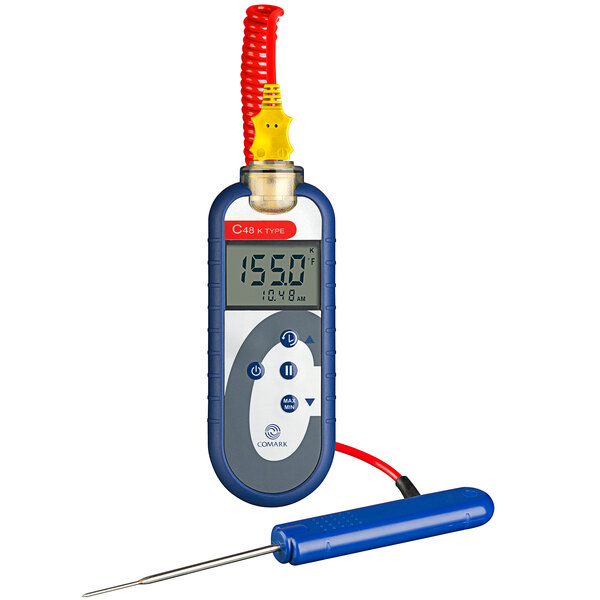 A Comark digital thermometer with a thin tip probe.