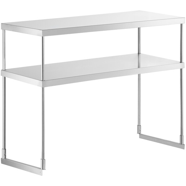 A white metal Avantco double deck overshelf with two shelves on it.