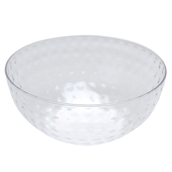 A clear bowl with a textured surface and dimples.