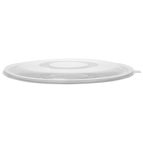 A clear plastic lid on a white surface over a white background.