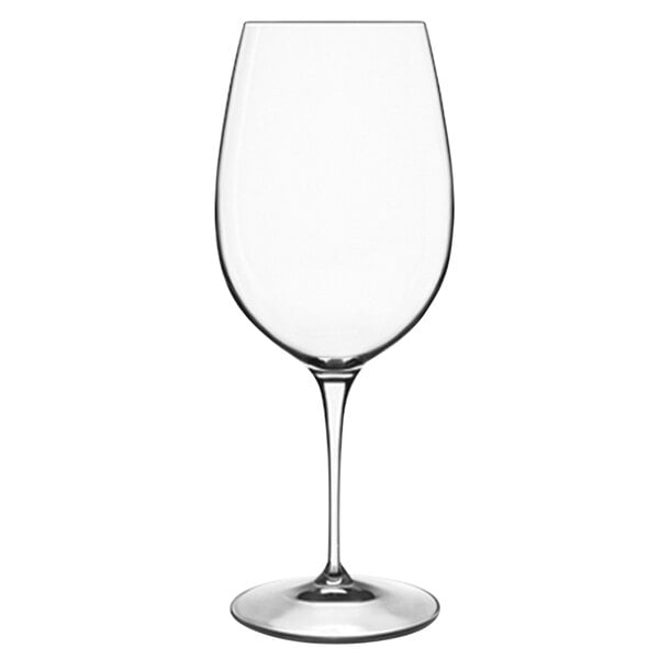 A close-up of a Luigi Bormioli Riserva red wine glass with a stem.