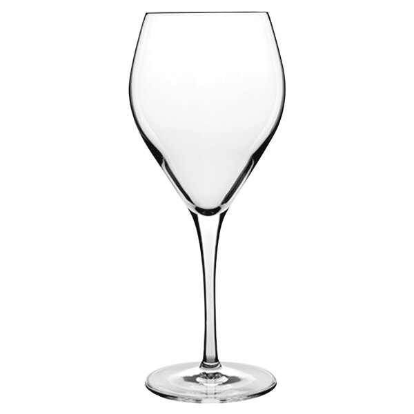A clear Luigi Bormioli Atelier white wine glass with a long stem.