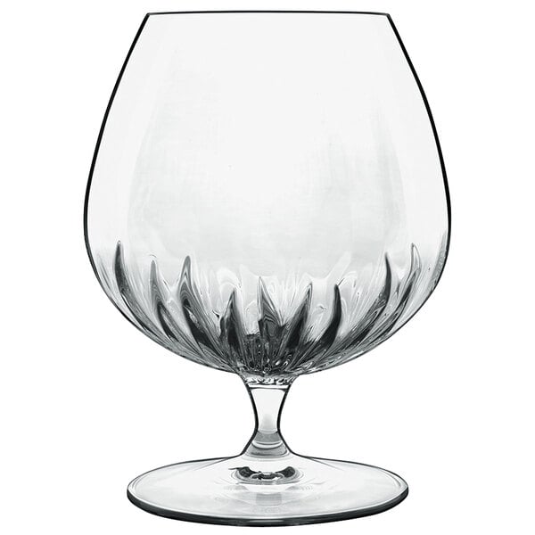 A clear Luigi Bormioli cognac glass with a stem.