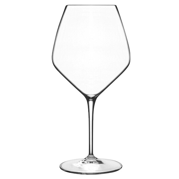 A close-up of a Luigi Bormioli Atelier Pinot Noir wine glass with a thin stem.