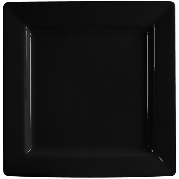 A black square porcelain plate with a white rim.
