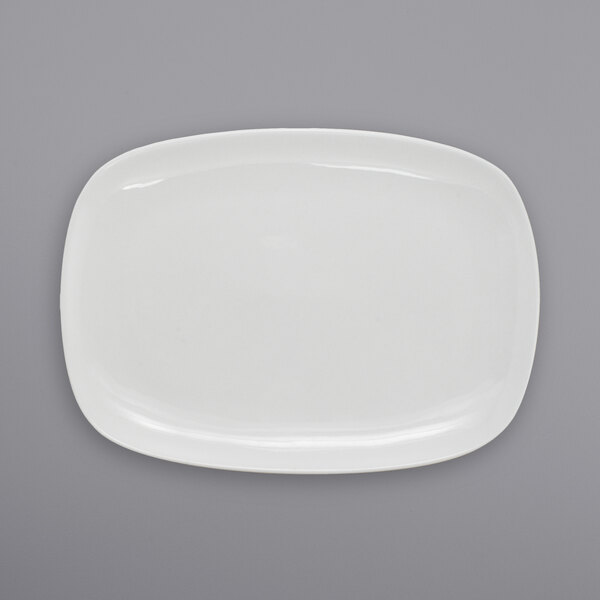 An International Tableware rectangular white porcelain platter on a gray background.