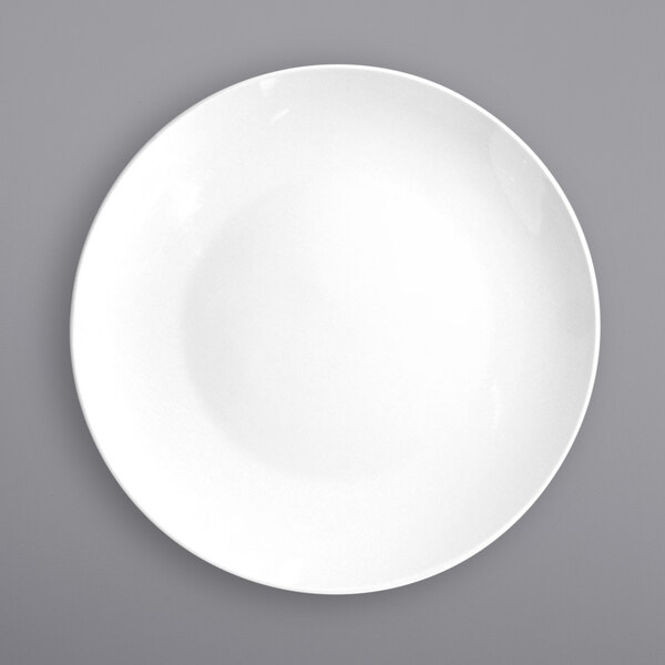 A white International Tableware Torino porcelain plate on a gray background.