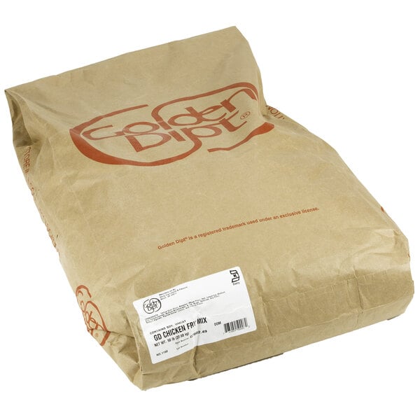 A brown bag of Golden Dipt Chicken Fry Mix with red and white text.