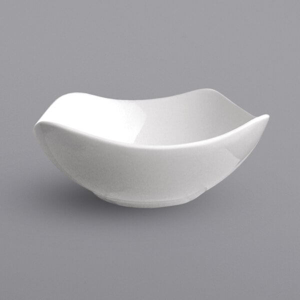 An International Tableware European white porcelain bowl with a flared rim.