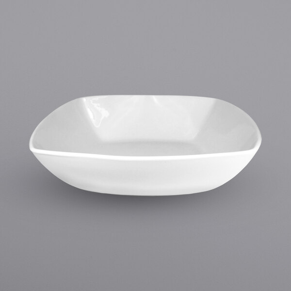 A white square International Tableware porcelain bowl.