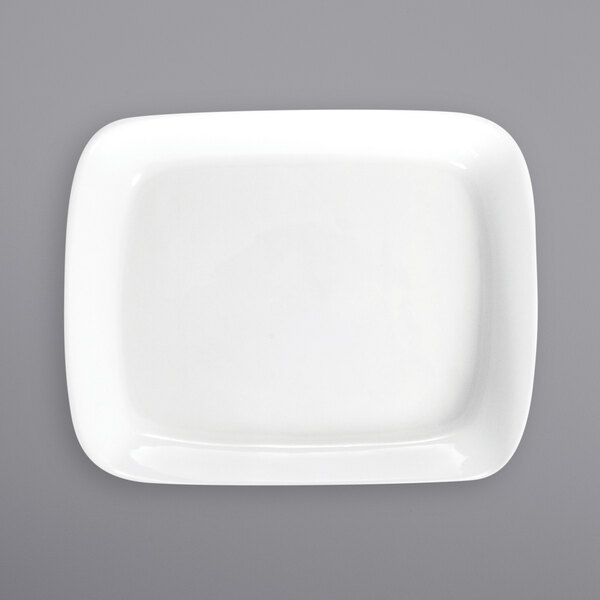 A white rectangular porcelain platter with a small rim.