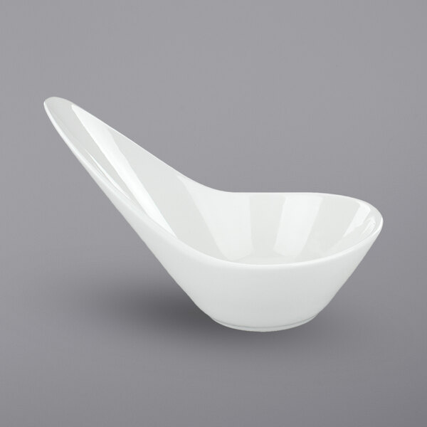 An International Tableware Dover white porcelain bowl with a curved edge.