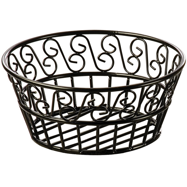 An American Metalcraft black wrought iron bread basket with swirls.