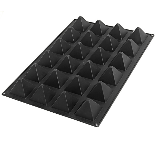 A black Silikomart plastic mold with 35 pyramid cavities.